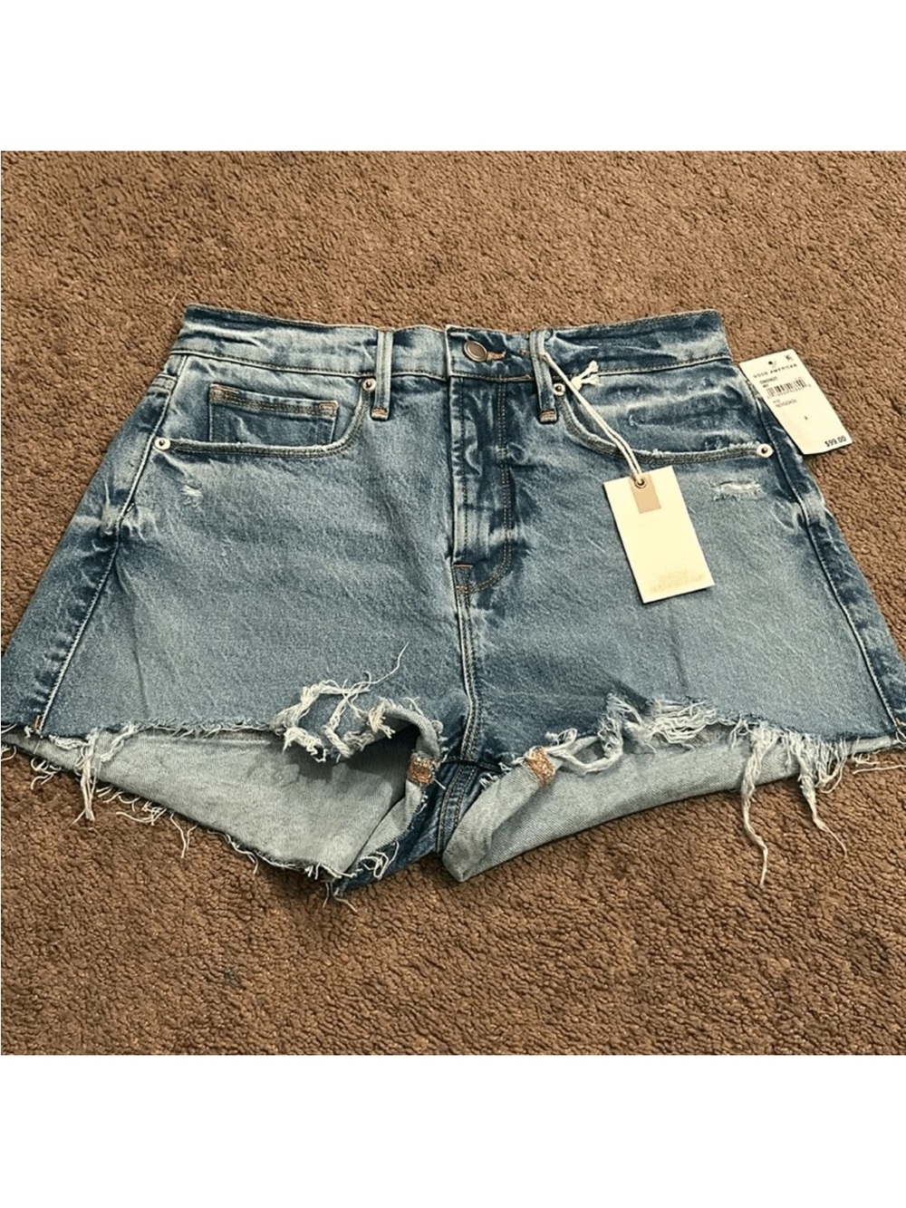 Good American Distressed Light Blue Denim Shorts